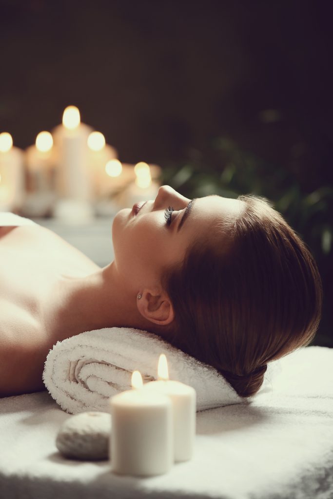 Massage. Beautiful girl in spa salon